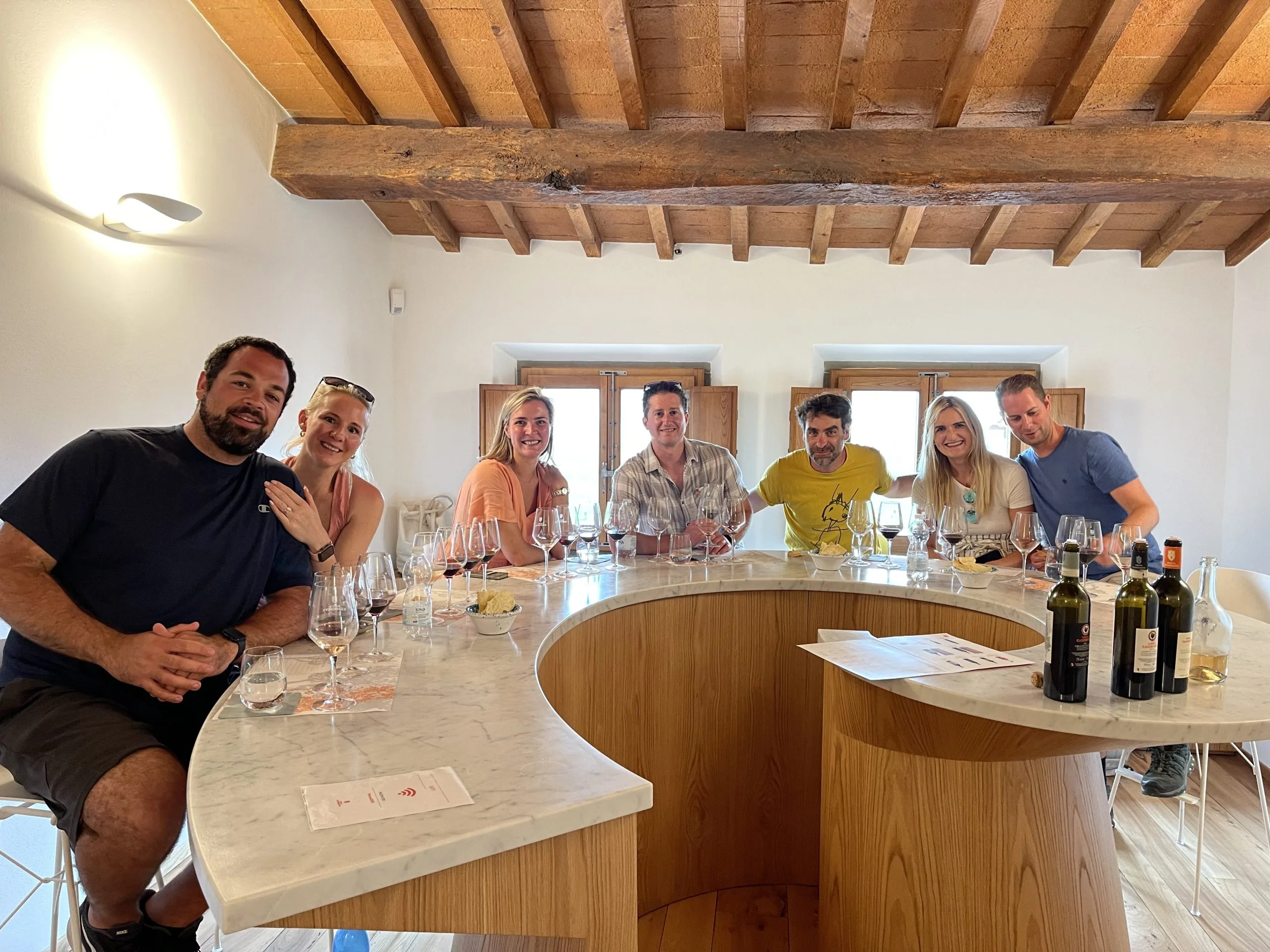 Group lunch at traditional Tuscan winery during Chianti wine hiking tour