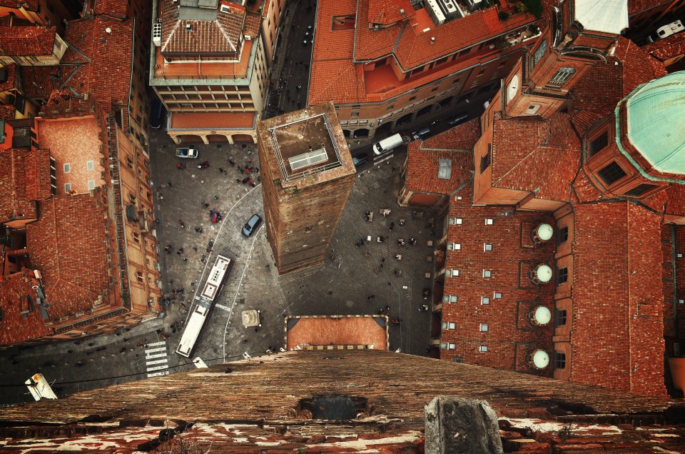 A quiet portico-lined street in Bologna's old town away from the crowds